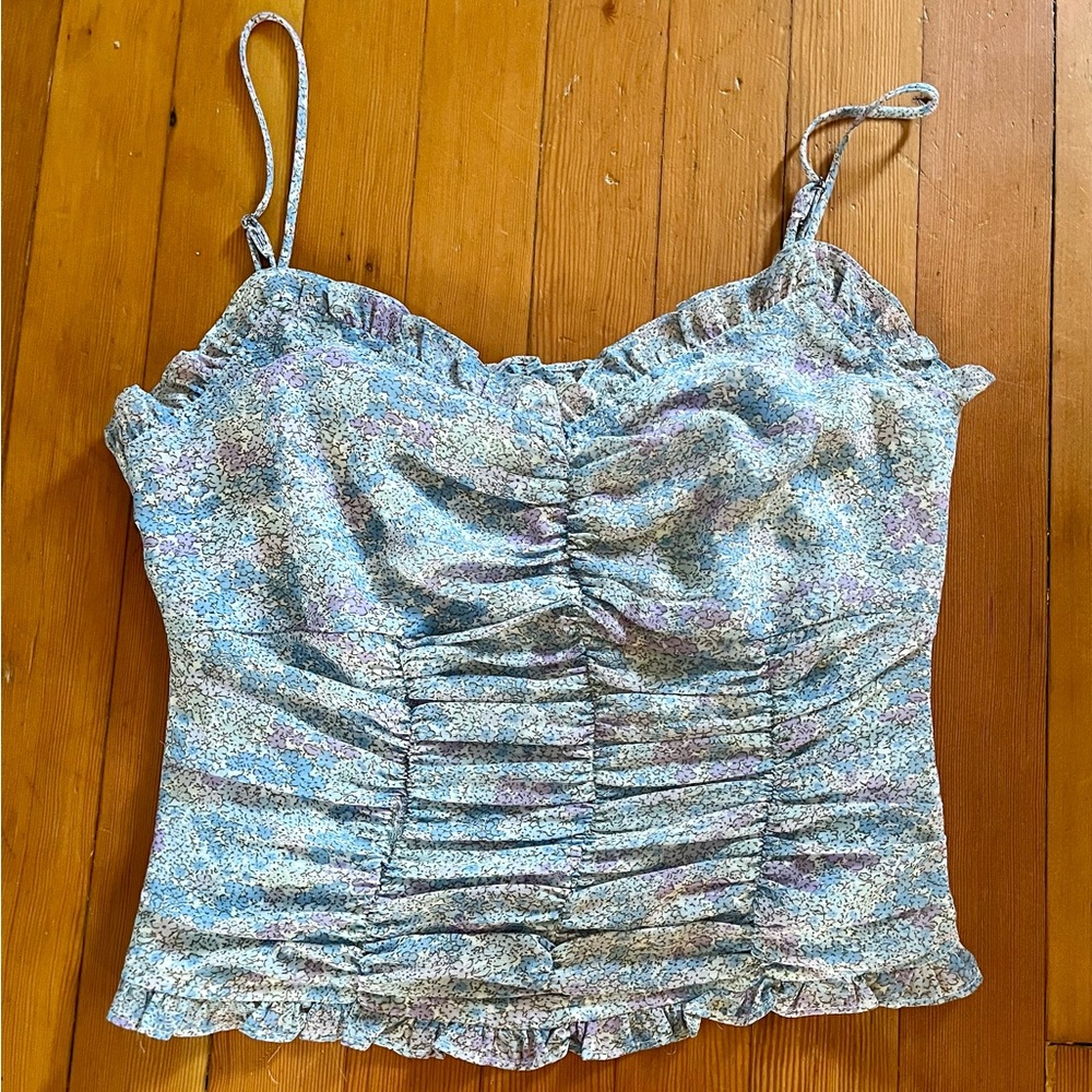 Aster floral chiffon tank with adjustable straps, smocked back, and zipper.